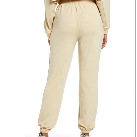 NWT WEWOREWHAT x REVOLVE Brushed Back Terry Cream Joggers, Large - Picture 4 of 10